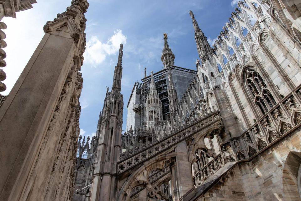 Milan: Cathedral and Terraces Guided Tour with Tickets - Terrace access by lift: spires, Madonnina, and city views that land