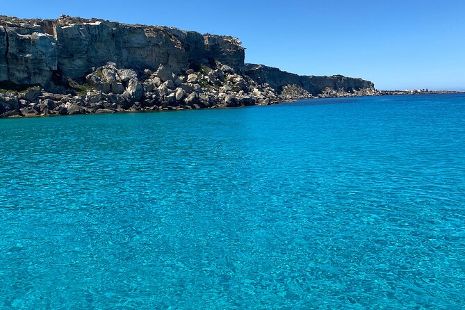 Mini Cruise to Favignana and Levanzo with lunch on board - Crossing to Levanzo: the Faraglione view and the small-island mood shift