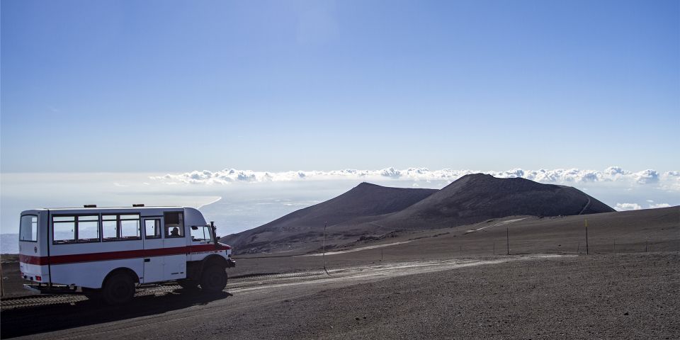 Mount Etna: Roundtrip Cable Car and 4x4 Bus Ticket - The guided walk around the Central Craters