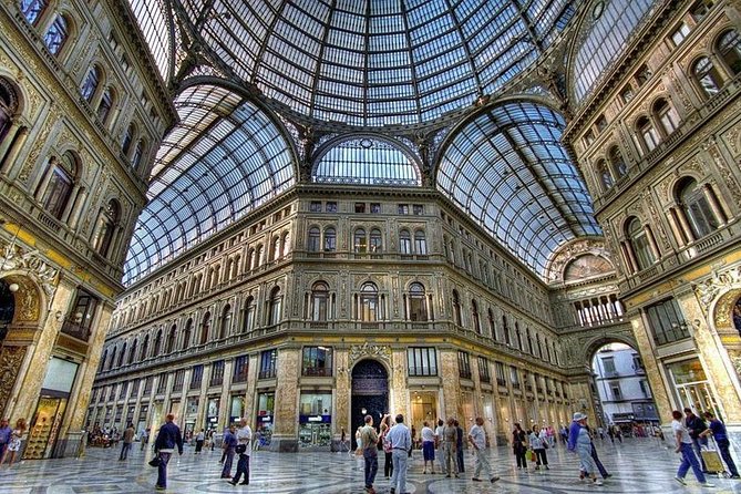 Naples City Walking Tour Exploring Naples with a Native Guide - Castel Nuovo and Piazza Municipio: Landmark Power in Plain Sight