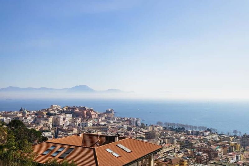Naples: Panoramic Walking Tour with Funicular - Walking Into the Center: Mount Vesuvius in the Background