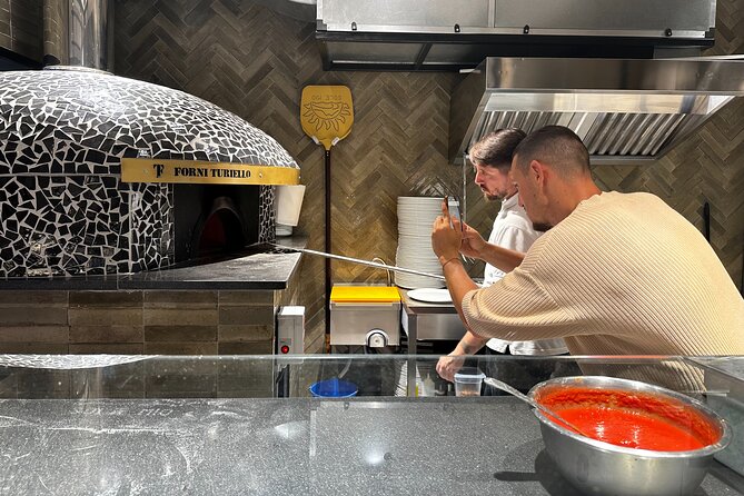Naples Pizza Class: Learn, Bake & Eat the Authentic Pizza Taste - The venue vibe: old-church atmosphere and a real pizzeria feel