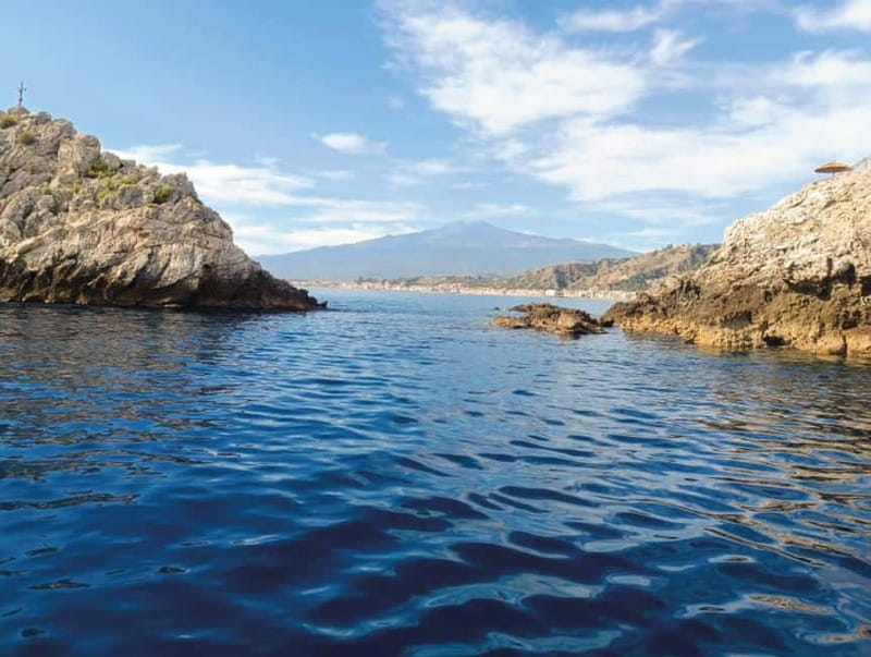 Naxos: Isola Bella, Blue Grotto, & Mazzarò Bay Boat Tour - Capo Taormina Faraglioni Photo Stop: Close Enough to Feel the Drama