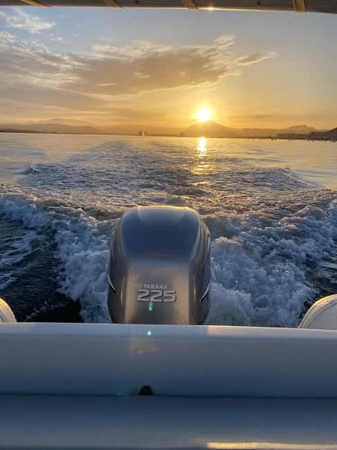 Olbia: Boat tour to watch Dolphins and snorkeling - Cala Moresca snorkeling: turquoise water, golden sand, and fish close by