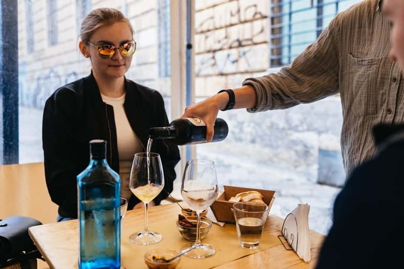 Palermo: Wine Tasting with Snacks at Bottega Monteleone - Small-group comfort in a wine bar setting