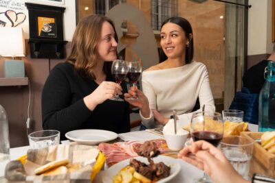 Parma: A Full Meal Walking Food Tour with a Local - The first stop: charcuterie, Parmigiano, and wine pairing