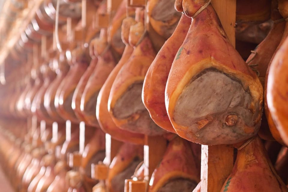 Parma: Cheese, Ham, & Balsamic Vinegar Tour with Tastings - Stop 2 in Parma Ham country: salting, aging, and Crown of Parma branding