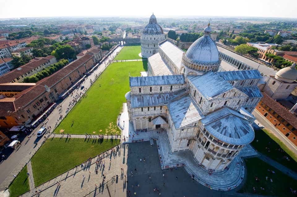 Pisa: Guided Walking Tour with Optional Leaning Tower Ticket - Walking through Piazza dei Miracoli like the monuments have a storyline