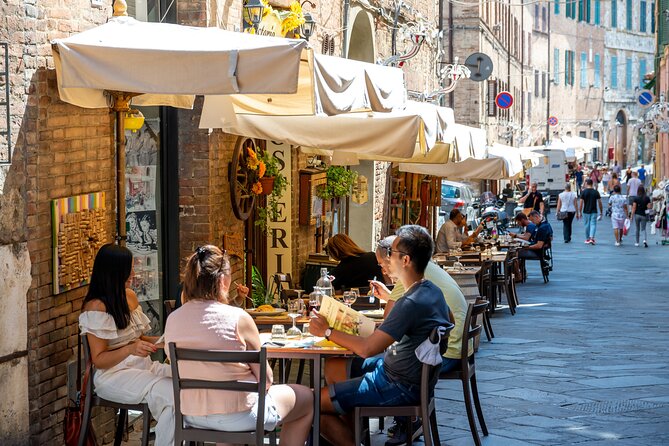 Pisa’s Ultimate Food Tour: Full Tuscan Meal by Do Eat Better - Stop 1: Lungarno wine bar cured meats with a river-view start