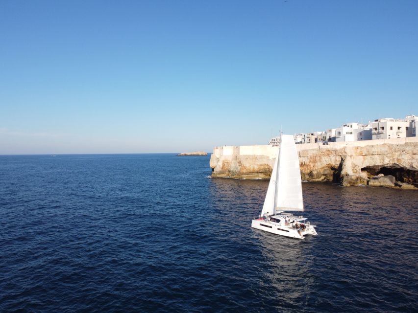 Polignano a Mare: Catamaran Tour with Aperitif & Local Food - Hermit’s Rock (San Paolo Islet): The Coast’s Curious Shape Up Close