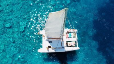 Porto Conte: Half-day catamaran tour with aperitif - Sailing Past Capo Caccia: Cliff Views That Keep Coming