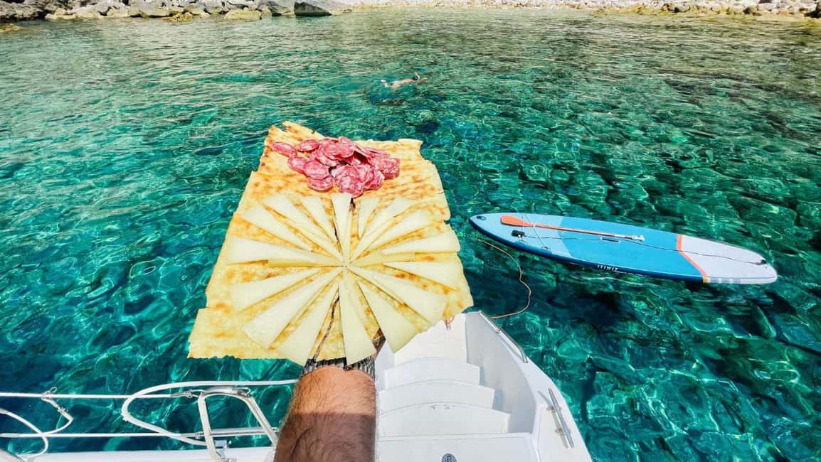 Porto Conte: Half-day catamaran tour with aperitif - The Aperitif: Sardinian Cheese, Sausage, and White Wine on a Catamaran