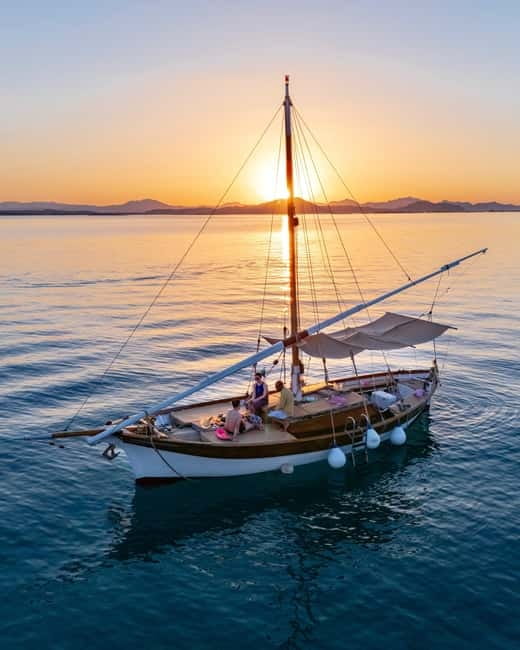 Porto San Paolo: Vintage Cruise Sunset Aperitif to Tavolara - Porto San Paolo to Tavolara: the vibe is the product
