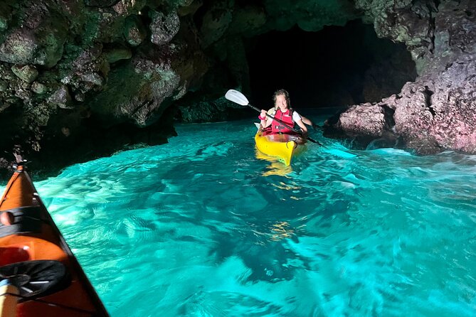 Porto Selvaggio kayak tour + cliff diving + cold spring immersion - Gaia Cave cliff jump: adrenaline with a reason to smile