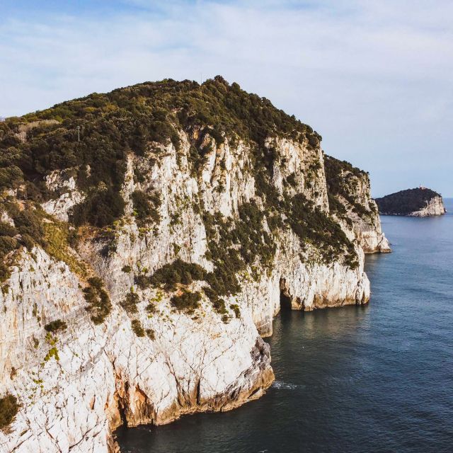 Portovenere: Isola Palmaria, Tino, and Tinetto Boat Tour - The Blue Cave and Church of San Pietro: how stories land from the boat