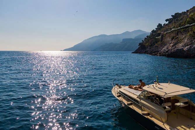 Private Boat Tour along the Amalfi Coast or Capri - Positano’s front row: Sirens islets and the coast UNESCO power