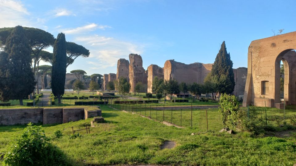 Rome: Appian Way Golf Cart Tour with Roman Catacombs Entry - Aurelian Walls and Pyramid of Cestius on the return loop