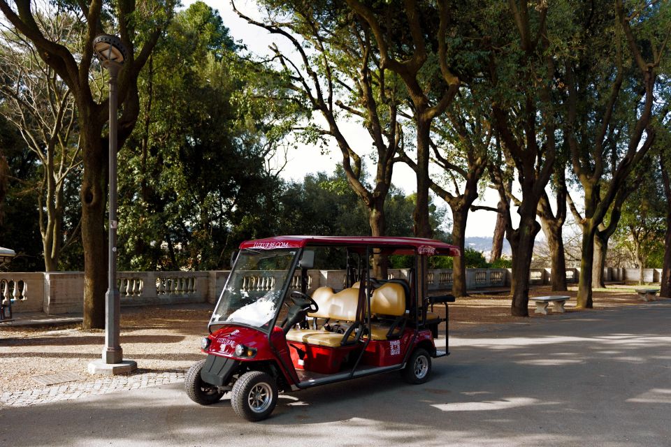 Rome: City Golf Cart at Night Tour - Colosseum after dark: lit up and usually less painful