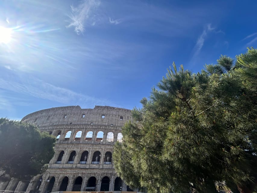 Rome: Colosseum Arena, Roman Forum & Palatine Tour - Titus and Constantine arches: imperial messaging in stone