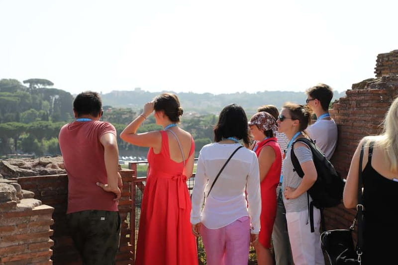 Rome: Colosseum & Roman Forum Guided Tour - Inside the Colosseum: gladiators, crowd choices, and the hidden plumbing