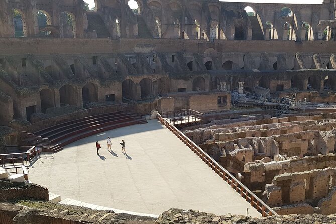 Rome Colosseum,Palatine Hill and Roman Forum Guided Tour - The Colosseum stop: arena drama, inauguration facts, and steep steps