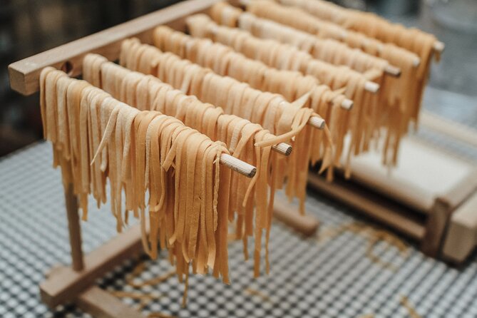 Rome Cooking Class: Make Pasta, Dine & Drink Wine With Local Chef - Making fettuccine and ravioli by hand (two classic shapes)