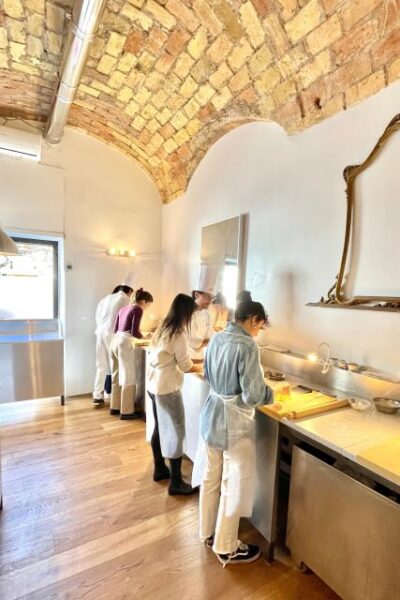 Rome: Five Shapes of Pasta Cooking Class in Ancient Tavern - Finding the Place: The Cucina Sign and a Real Local Setting