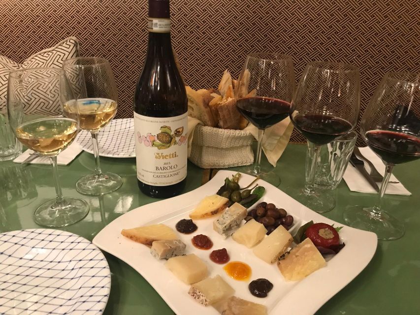 Rome: Food Tour near Vatican City with Wine - Stop 1: The gourmet shop start for cheese, cured meats, and wine