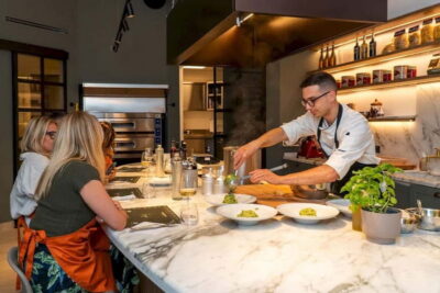 Rome: Hands-On Pasta & Tiramisu Class with Unlimited Wine - Walking into the kitchen: where the evening sets its pace