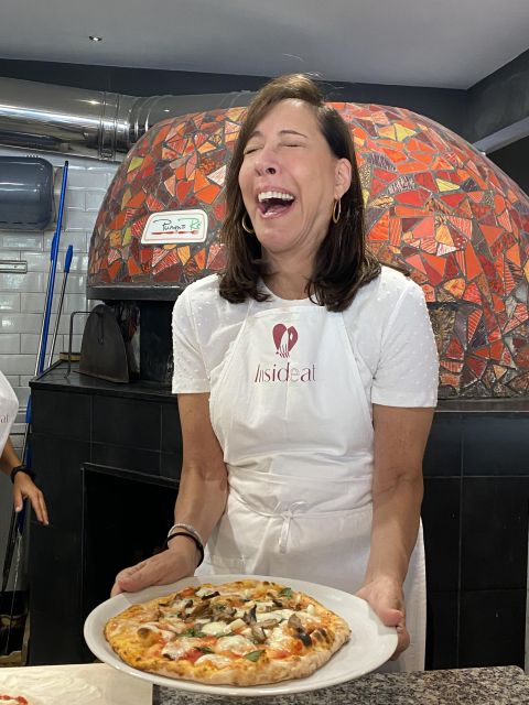 Rome: Hands-On Pizza Making Class near the Vatican with Wine - The pizza oven moment: when it gets real