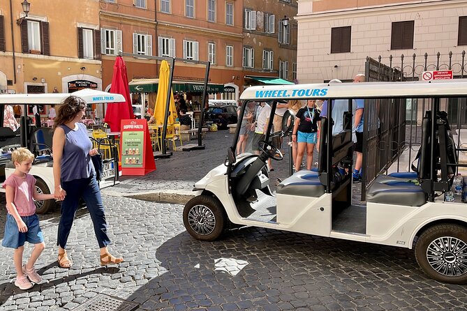 Rome Highlights City Tour by Golf Cart with Gelato - Piazza Venezia, Trajan’s Column, and the Tiber views: power and perspective