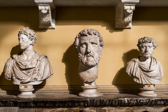 Rome in a Day Tour with Vatican, Colosseum and Historic Center - Inside the Vatican Museums: Laocoön, Raphael Rooms, and the bronze globe courtyard