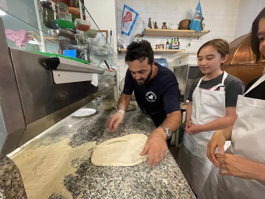 Rome: Neapolitan Pizza Cooking Class in Front of the Vatican - Toppings and baking: tomato, mozzarella, and a wood-fired oven