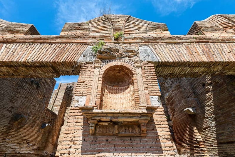Rome: Ostia Antica Archaeological Park Ticket & Audio App - Procoio Baths and the Amphitheater of Masks