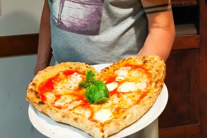 Rome: Pizza & Tiramisu Class with Free Flowing Fine Wine - Price and value: $47.16 for lunch, pizza skills, and wine
