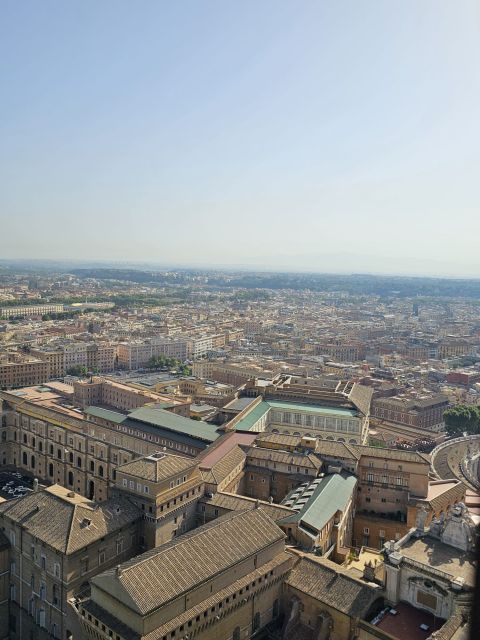 Rome: St. Peter's Basilica and Papal Tombs Guided Tour - Inside the Basilica: marble floors, gold ceilings, and key artwork