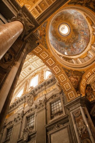 Rome: St. Peter's Basilica Guided Tour with Papal Tombs - Inside the basilica: a Renaissance masterpiece with multiple architects