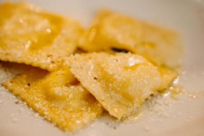 Rome: Traditional Pasta Making Class with Wine & Gelato - The hands-on pasta lesson: turning dough into fettuccine