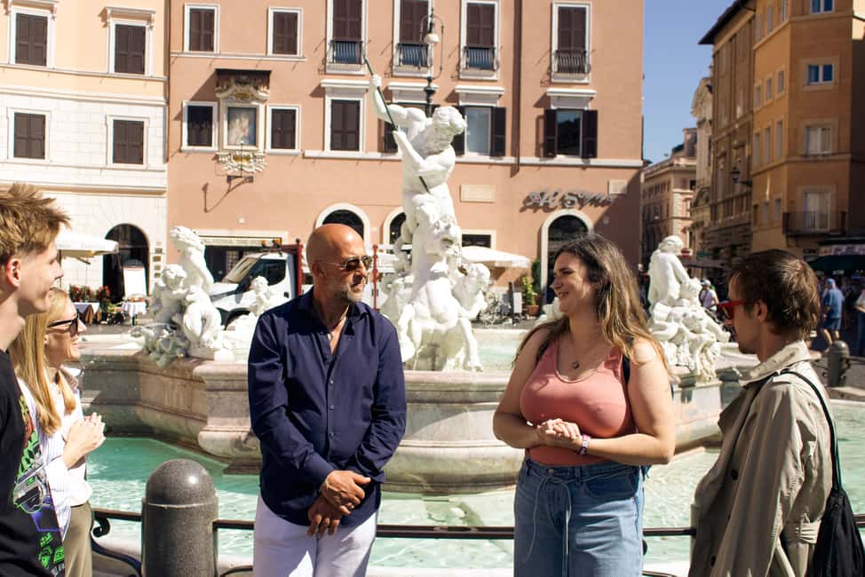 Rome: Under the Moonlight Evening Walking Tour - Piazza Navona at night: where the tour finds its pace