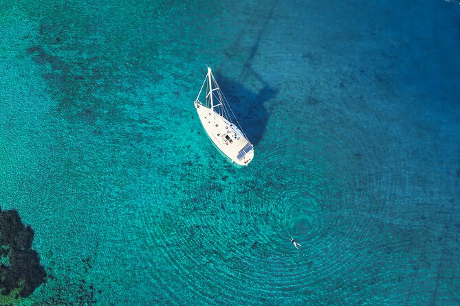 Sailing Cruise to Dia Island with Meal and Water Activities - Dia Island water time: swim, snorkel, SUP, and what’s actually included