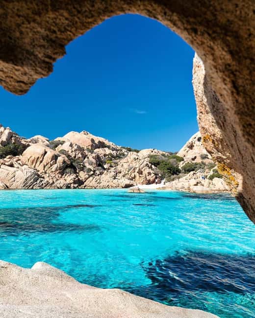 Sardegna: Tavolara Boat Tour with Snorkeling - Orecchio di Ulisse and Grotta della Madonnina: caves, rock, and a guided story