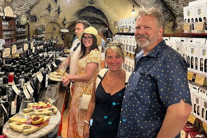 Siena, Cortona, Montepulciano & Val D'Orcia in a Small Group Tour - Piazza Grande and the underground cellar in Montepulciano