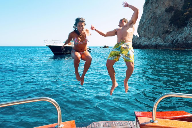 Small Group Boat Day Excursion to Capri Island from Sorrento - Faraglioni rocks: the coastline icon you’ll recognize instantly
