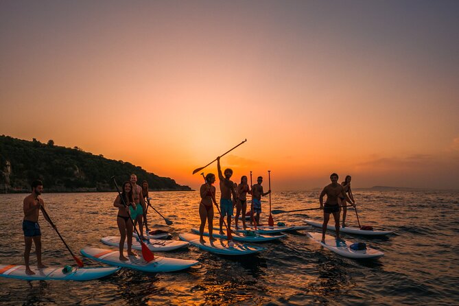 Small group paddle boarding tour to Bagni Regina Giovanna - Entering Bagni Regina Giovanna: cliffs, ruins, and that heart-shaped pool