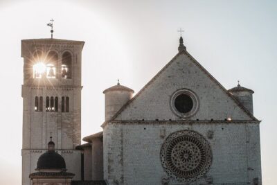Small Group Tour of Assisi and St. Francis Basilica - St. Clare in pink stone: frescoes and the Crucifix tradition