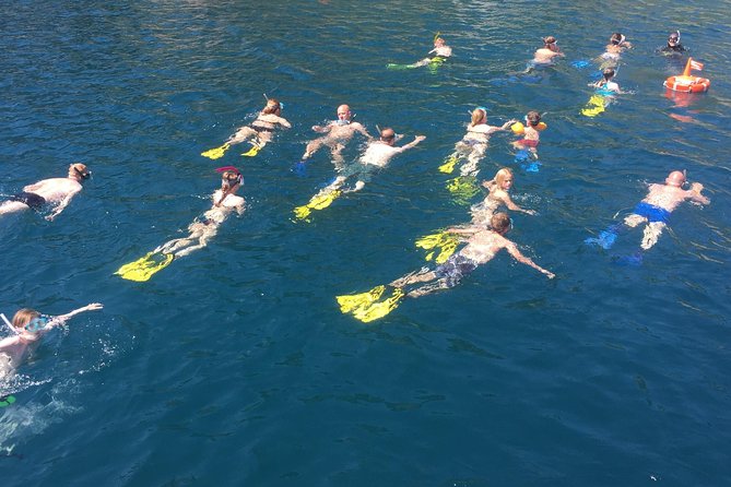 Snorkeling Tour Coast to Coast Taormina and Isola Bella - Boat Comfort and Group Size: Expect Helpful Crew, Not a Party Boat