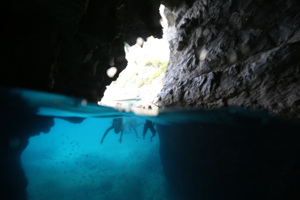 Sorrento: Capri and Blue Grotto Boat Cruise with Drinks - The Capri cruise route: Faraglioni and caves from sea level