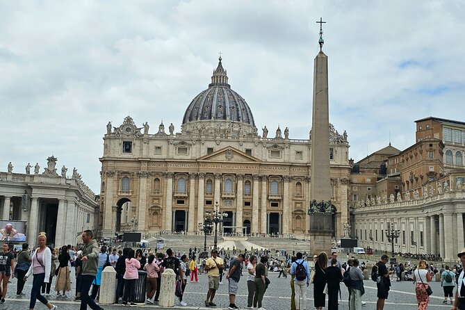 St. Peter's Basilica Dome to Underground Grottoes Tour - St. Peter’s Square First: Bernini’s Visual Tricks and the Obelisk