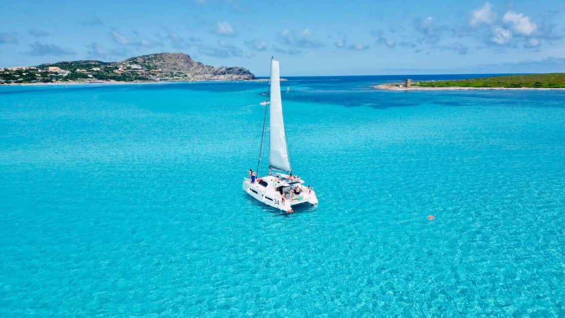 Stintino: Half-day catamaran tour to La Pelosa with aperitif - Fornelli Natural Pools: your first real swim moment