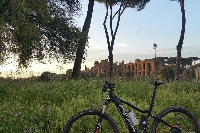 Sunrise in Rome: Small Group E-Bike tour with Italian Breakfast - The ride back through central Rome and the surprise factor